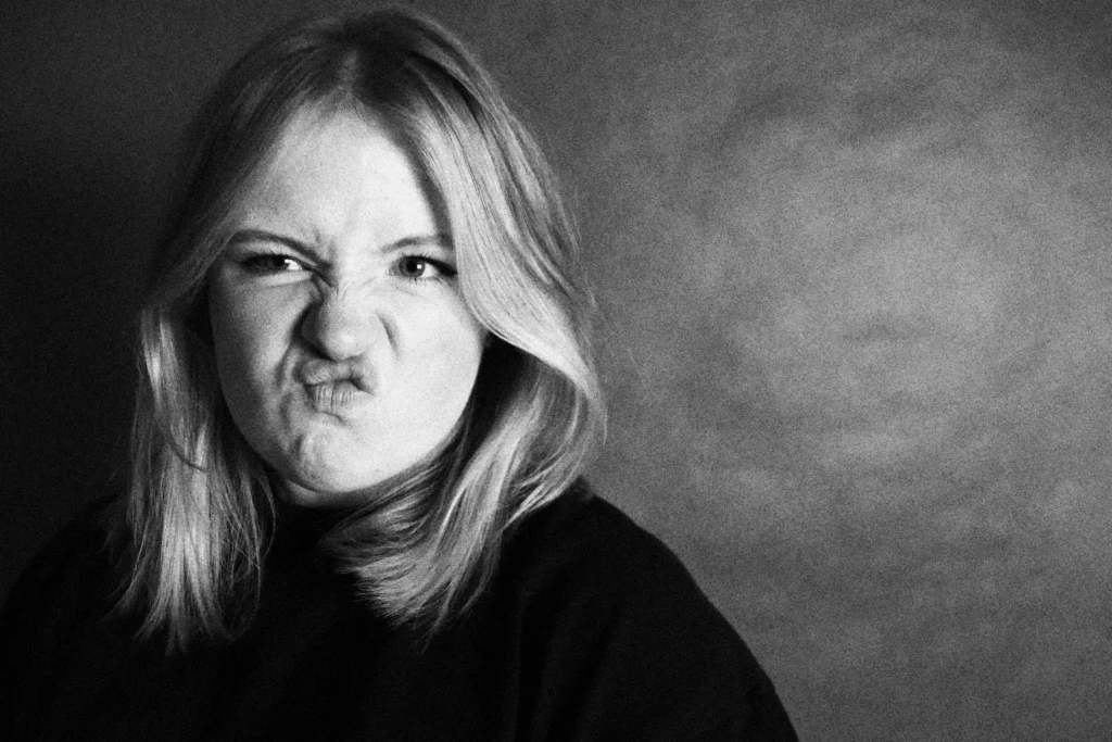 A woman with an annoyed facial expression