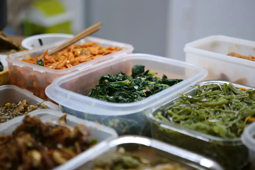 Plastic food containers full of food