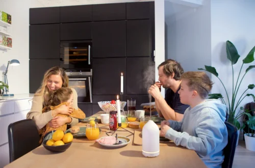 family having dinner. Environmental health for families.